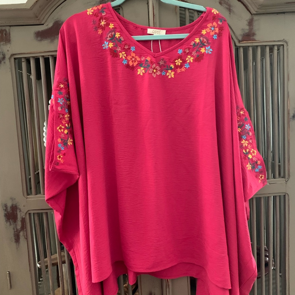Poncho style embroidered top